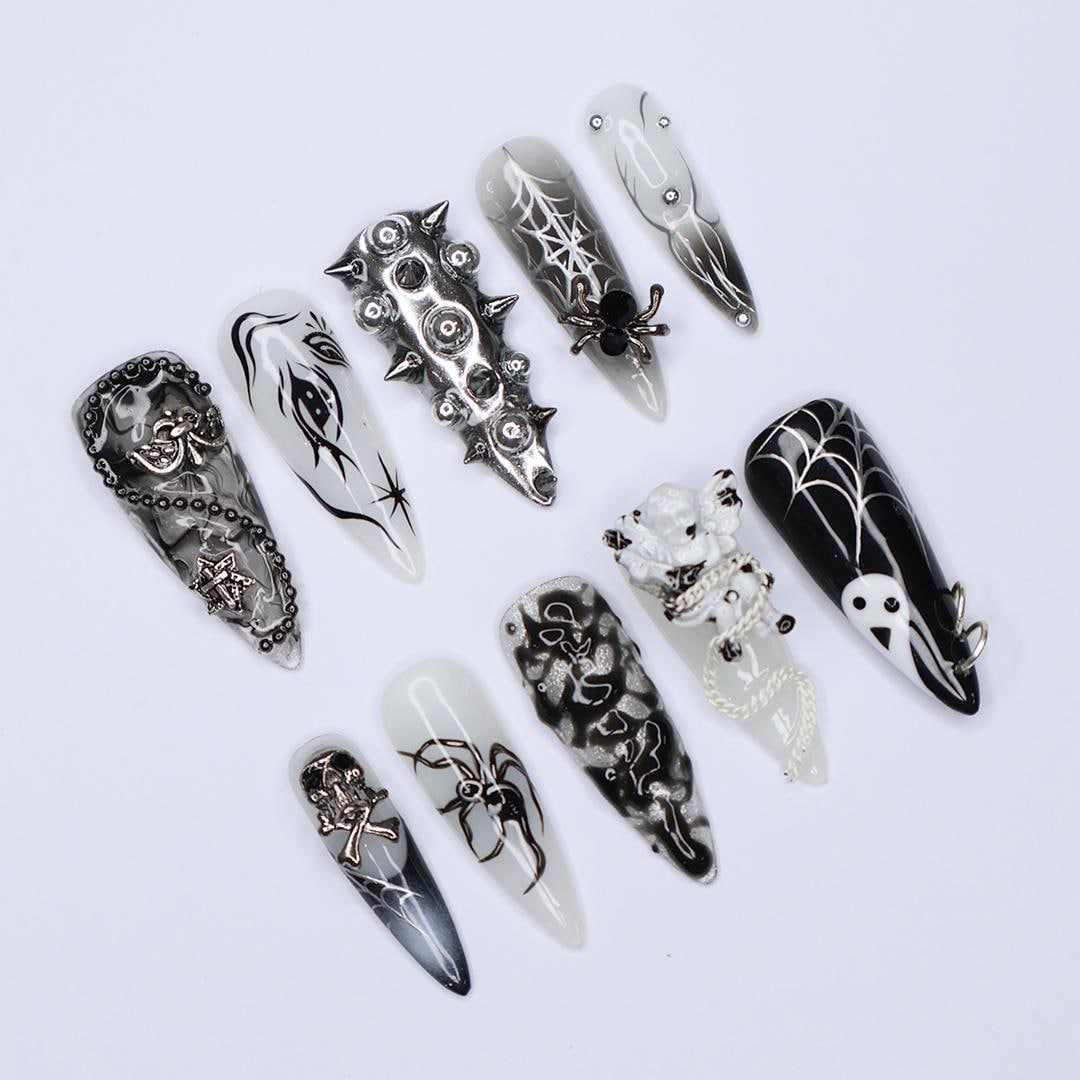 Black and Silver 3D Press-On Nails with Spikes, Chains, and Gothic Designs, Long Stiletto Nails for Halloween or Goth Fashion