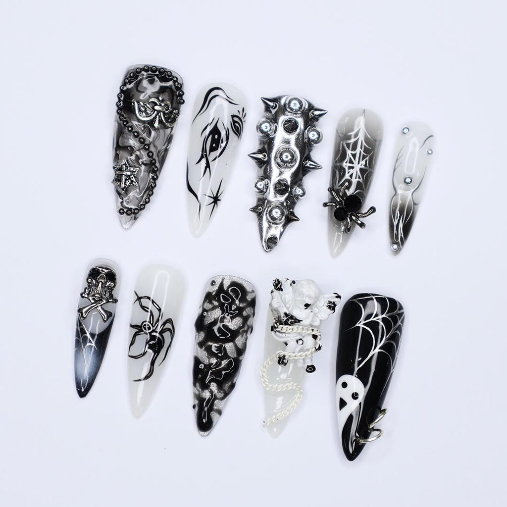 Black and Silver 3D Press-On Nails with Spikes, Chains, and Gothic Designs, Long Stiletto Nails for Halloween or Goth Fashion