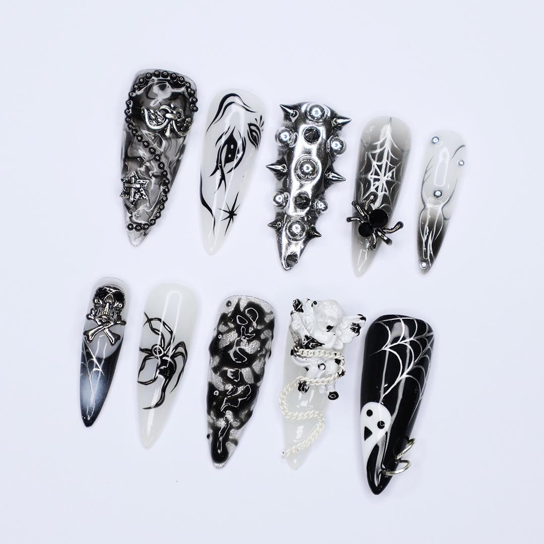 Black and Silver 3D Press-On Nails with Spikes, Chains, and Gothic Designs, Long Stiletto Nails for Halloween or Goth Fashion
