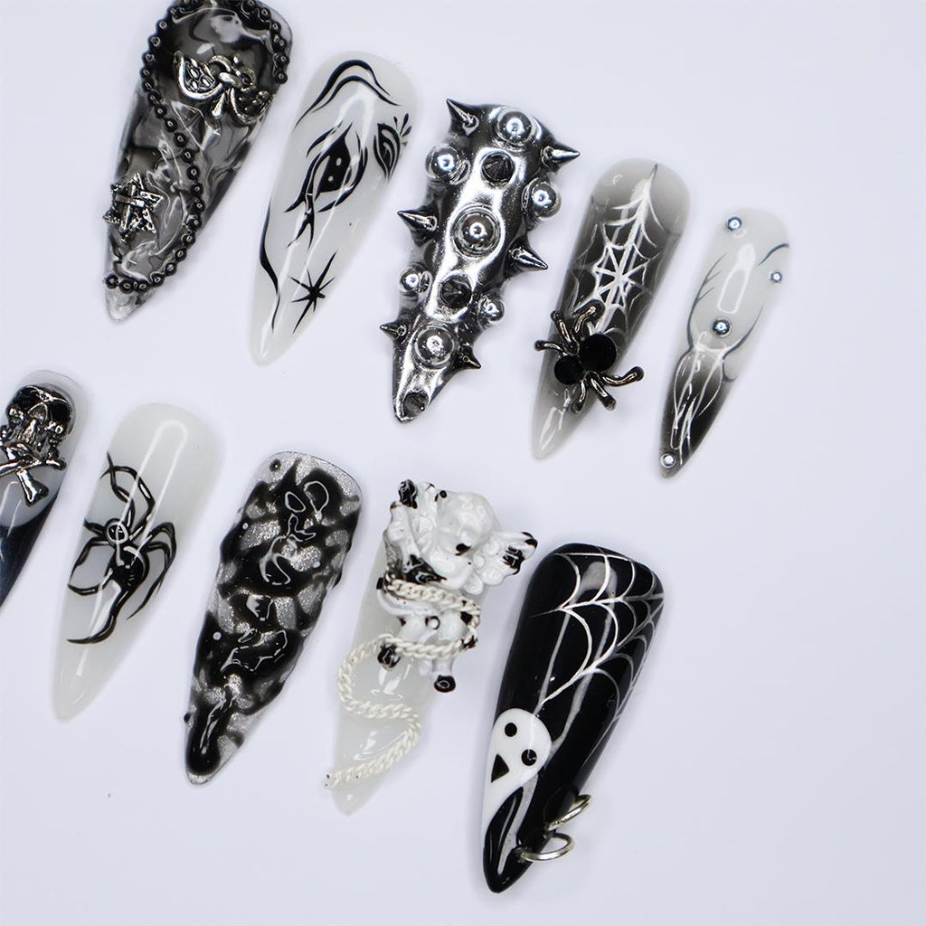 Black and Silver 3D Press-On Nails with Spikes, Chains, and Gothic Designs, Long Stiletto Nails for Halloween or Goth Fashion