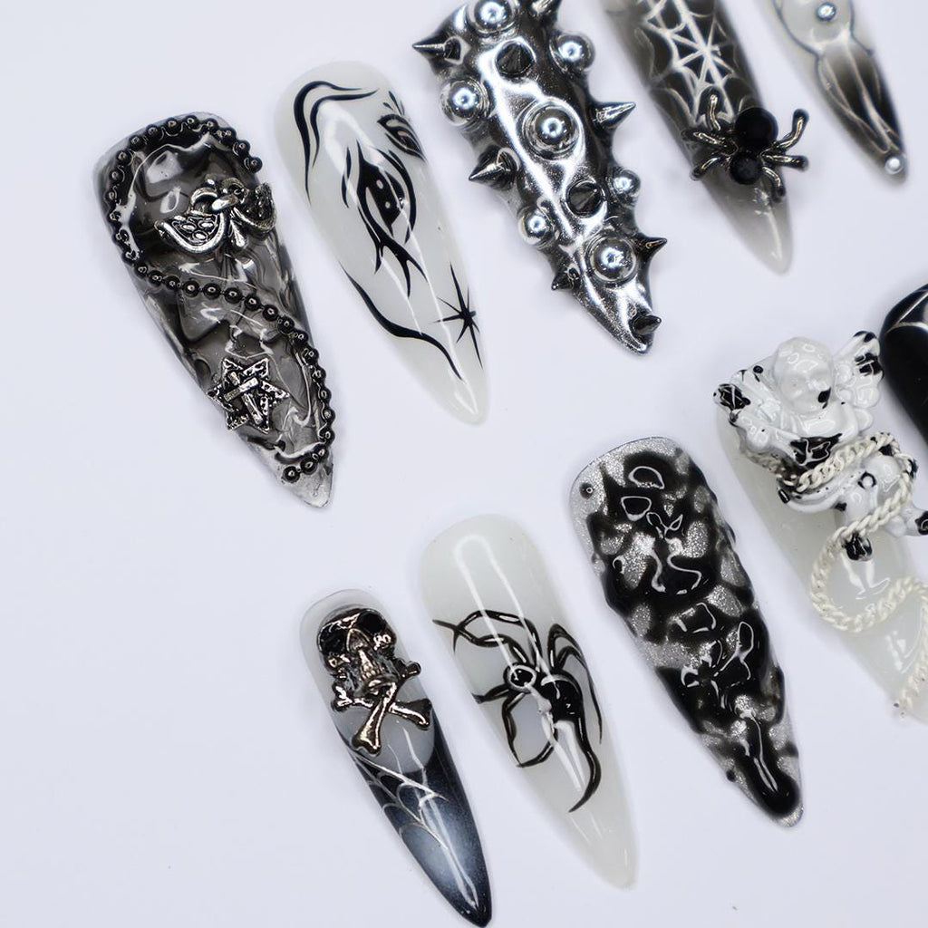Black and Silver 3D Press-On Nails with Spikes, Chains, and Gothic Designs, Long Stiletto Nails for Halloween or Goth Fashion