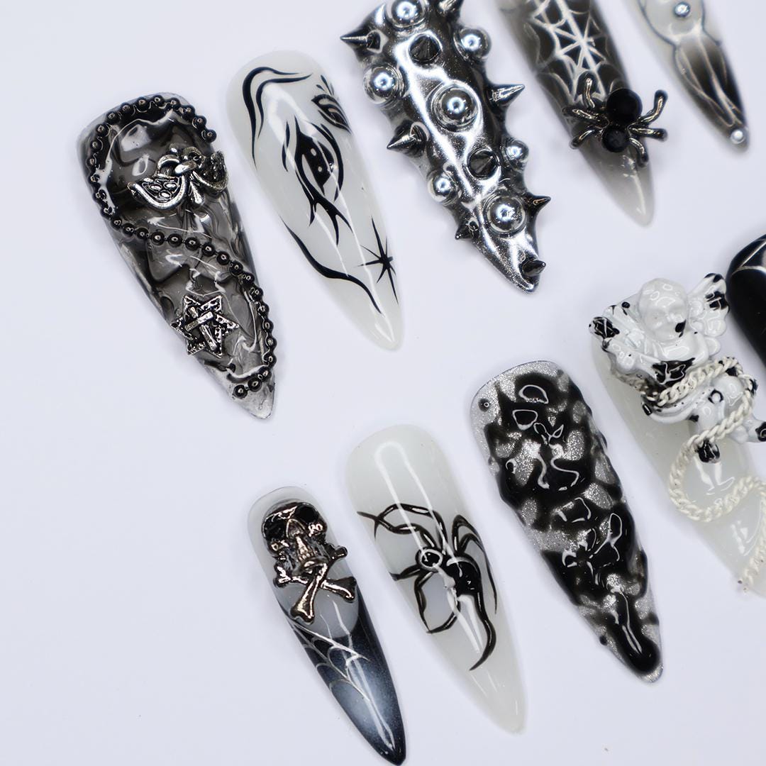 Black and Silver 3D Press-On Nails with Spikes, Chains, and Gothic Designs, Long Stiletto Nails for Halloween or Goth Fashion