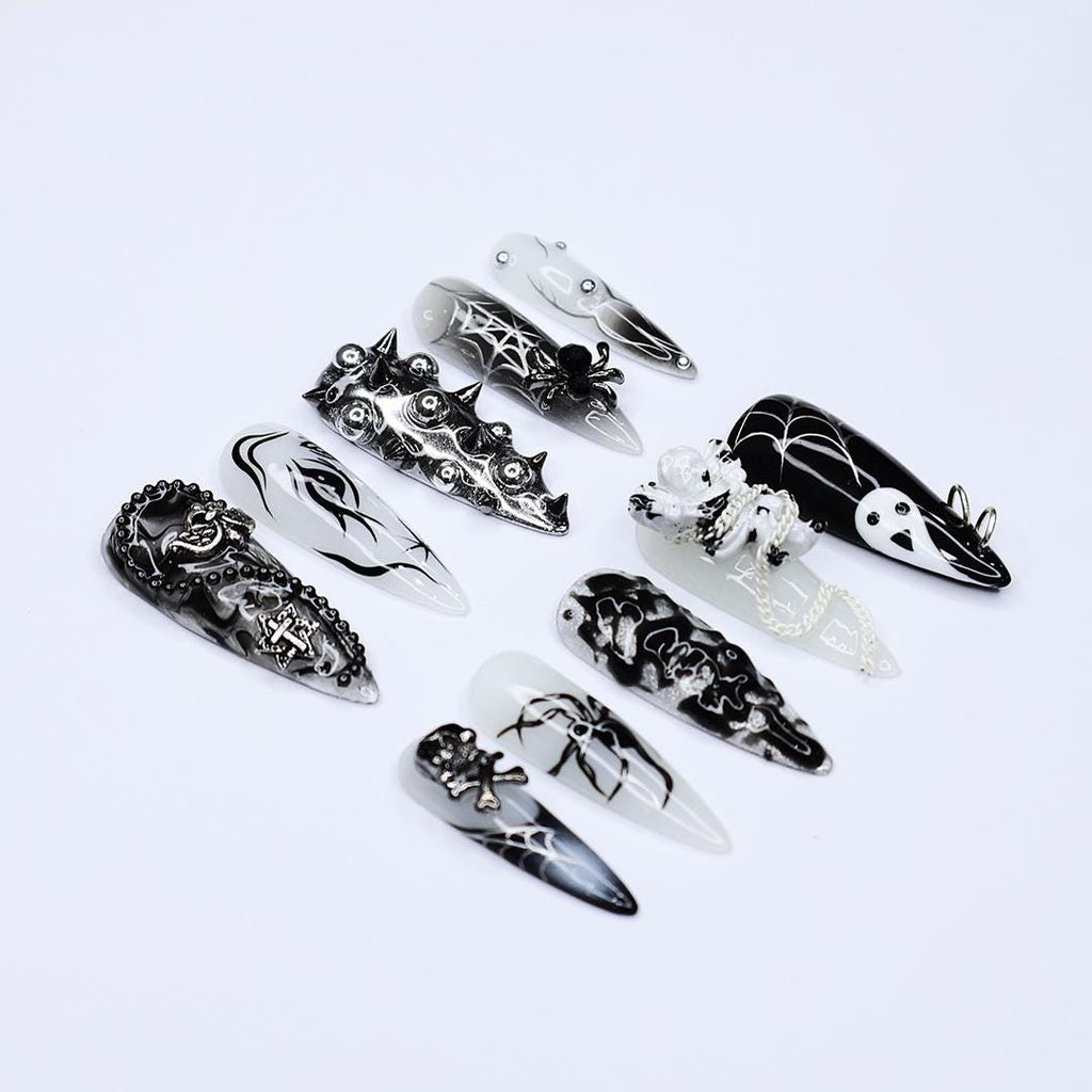 Black and Silver 3D Press-On Nails with Spikes, Chains, and Gothic Designs, Long Stiletto Nails for Halloween or Goth Fashion