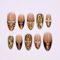 Fierce Fall Vibes, French Tips Meet Wild Tiger Print with 3D Gel Chrome Gold Cross and Dazzling Gems - Perfect for Your Autumn Style