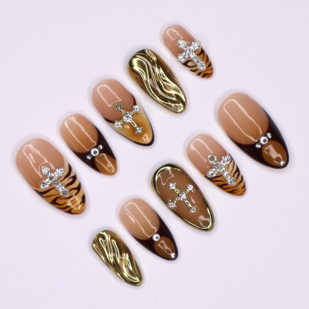 Fierce Fall Vibes, French Tips Meet Wild Tiger Print with 3D Gel Chrome Gold Cross and Dazzling Gems - Perfect for Your Autumn Style