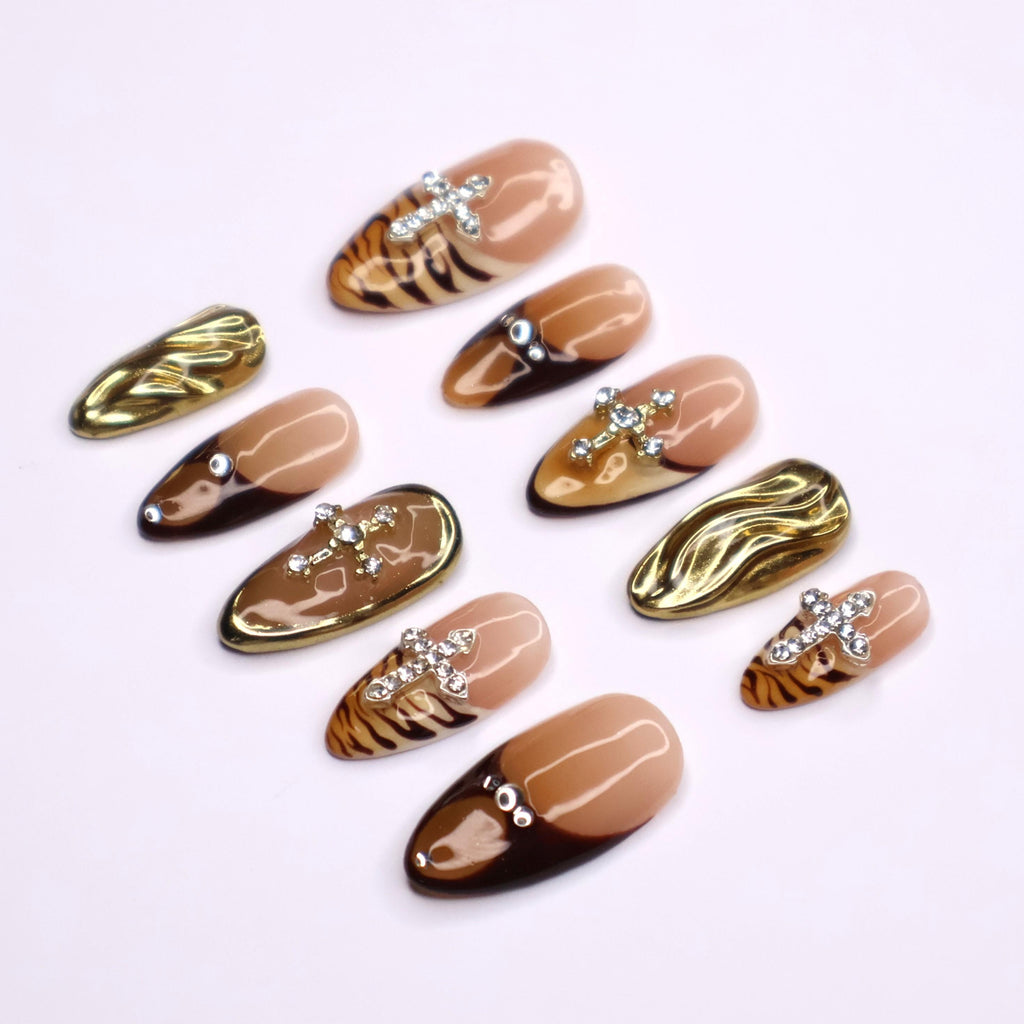 Fierce Fall Vibes, French Tips Meet Wild Tiger Print with 3D Gel Chrome Gold Cross and Dazzling Gems - Perfect for Your Autumn Style
