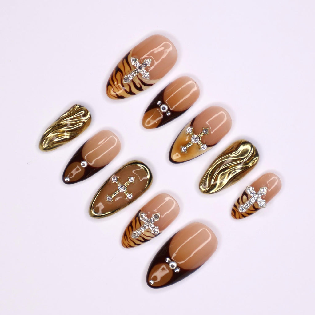 Fierce Fall Vibes, French Tips Meet Wild Tiger Print with 3D Gel Chrome Gold Cross and Dazzling Gems - Perfect for Your Autumn Style