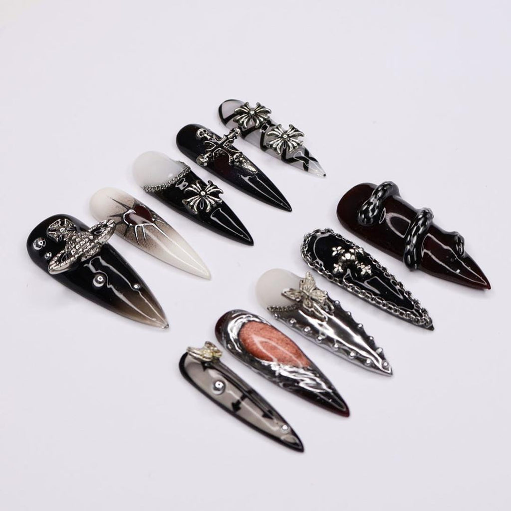 Elegant Gothic Stiletto Press-On Nails: Silver Cross Charm & Planet Accents on Chic French Tips with Intricate Chain Details