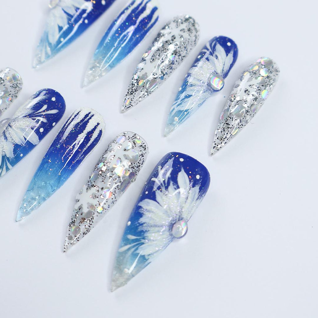 Winter Elegance: Long Stiletto Press-On Nails Adorned with White Flowers in Snow - Perfect for Christmas Day or the Ultimate Gift for Her