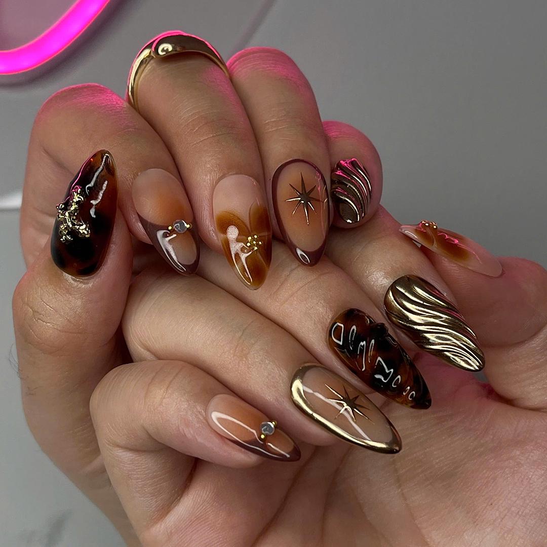 Fall Press On Nails with Tortoise Shell and Gold 3D Accents, Medium Almond Brown and Nude Nails with Starburst and Textured Chrome Design