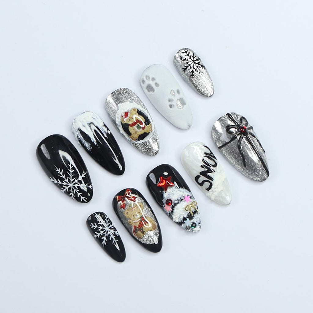 Elevate Your Holiday Style with Medium Almond Press-On Nails: Sleek Black Design Adorned with White Snowflakes - Perfect Christmas Gift
