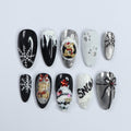 Elevate Your Holiday Style with Medium Almond Press-On Nails: Sleek Black Design Adorned with White Snowflakes - Perfect Christmas Gift