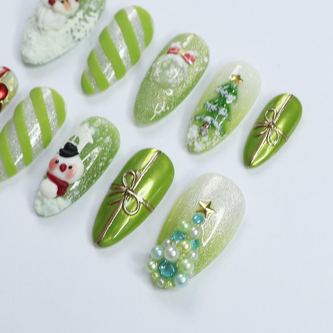 Festive Green Medium Almond Press-On Nails: Adorned with Santa Claus, Snowman Designs - Perfect for Christmas Day or Gift for Her