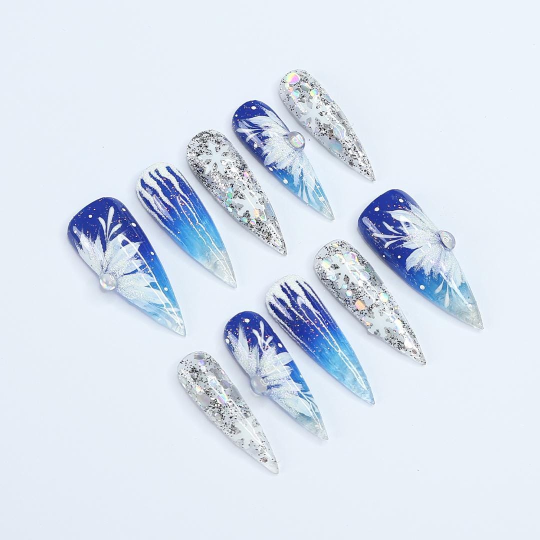 Winter Elegance: Long Stiletto Press-On Nails Adorned with White Flowers in Snow - Perfect for Christmas Day or the Ultimate Gift for Her