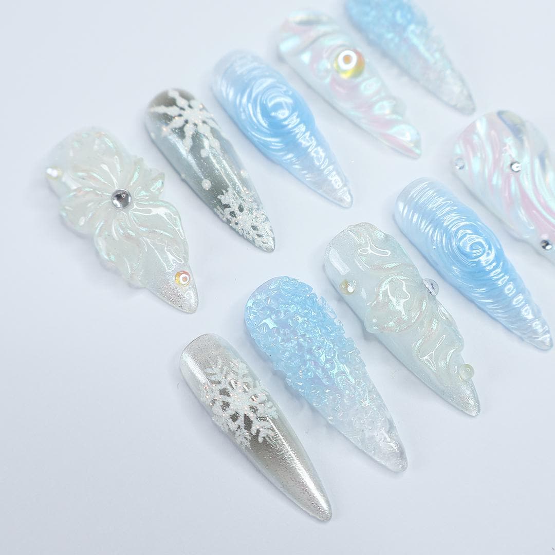 Chilly Elegance: Long Almond Press-On Nails Adorned with 3D Flowers, Perfectly Themed for Christmas Celebrations and Gifting