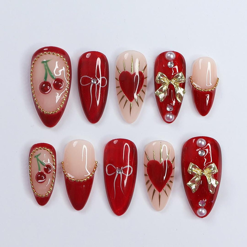 Chic Dark Red Press-On Nails: Adorned with Gold Bows, Charming Cherries & Sparkling Gems - Perfect Holiday Glam or Thoughtful Gift for Her