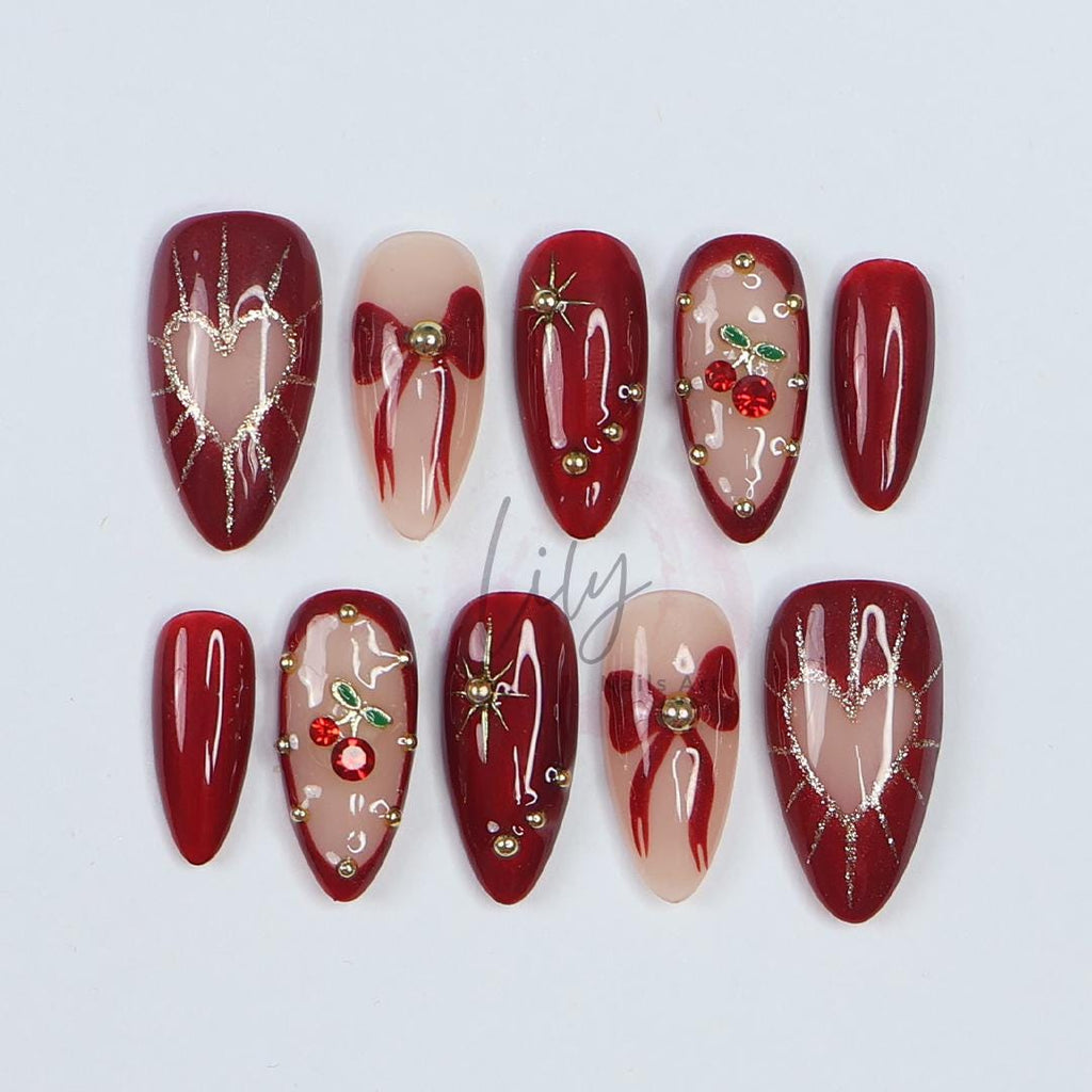 Valentine Vibes: Cherished Cherry Nail Art, Medium press-on nails adorned with bows & gold glitter - the perfect gift for her