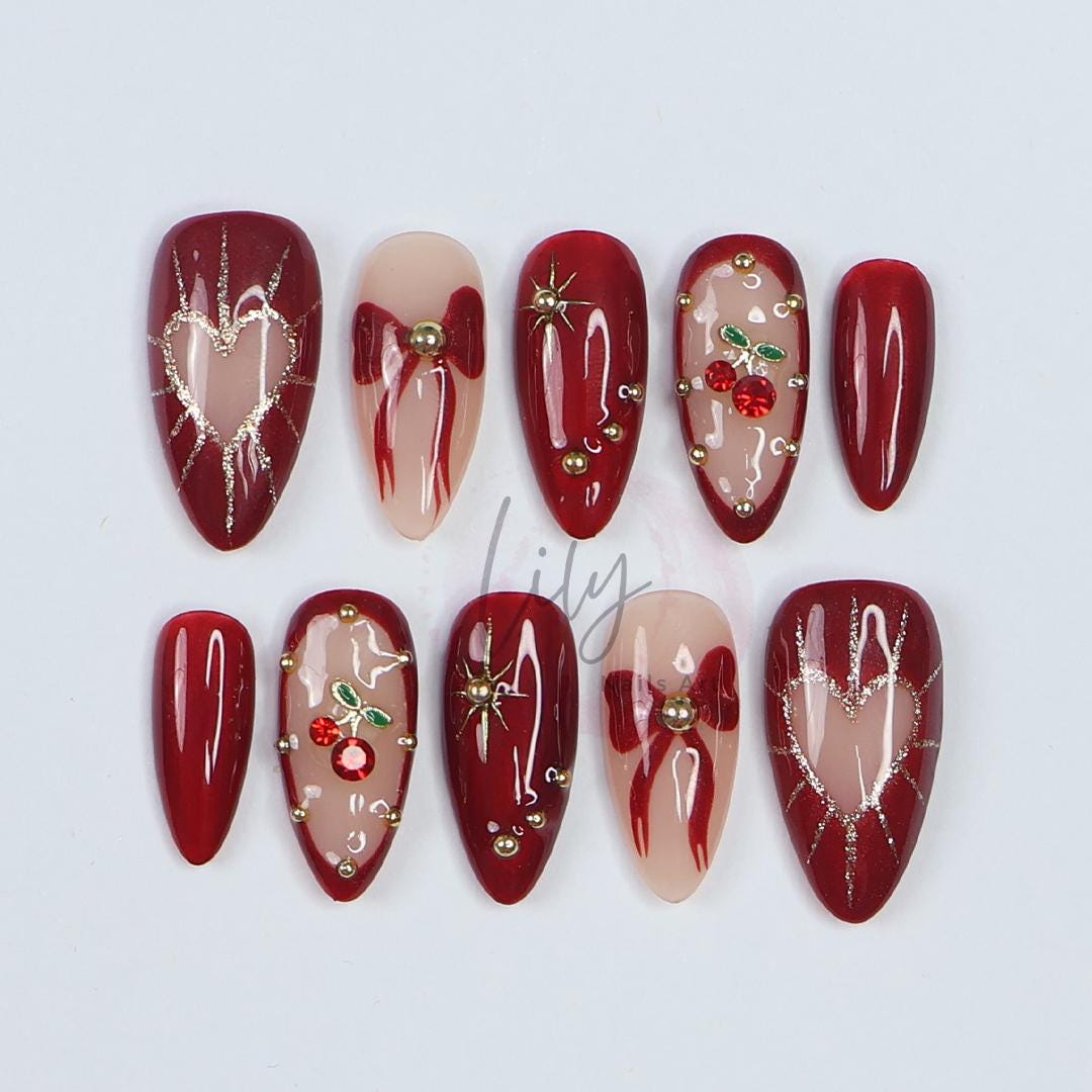 Valentine Vibes: Cherished Cherry Nail Art, Medium press-on nails adorned with bows & gold glitter - the perfect gift for her