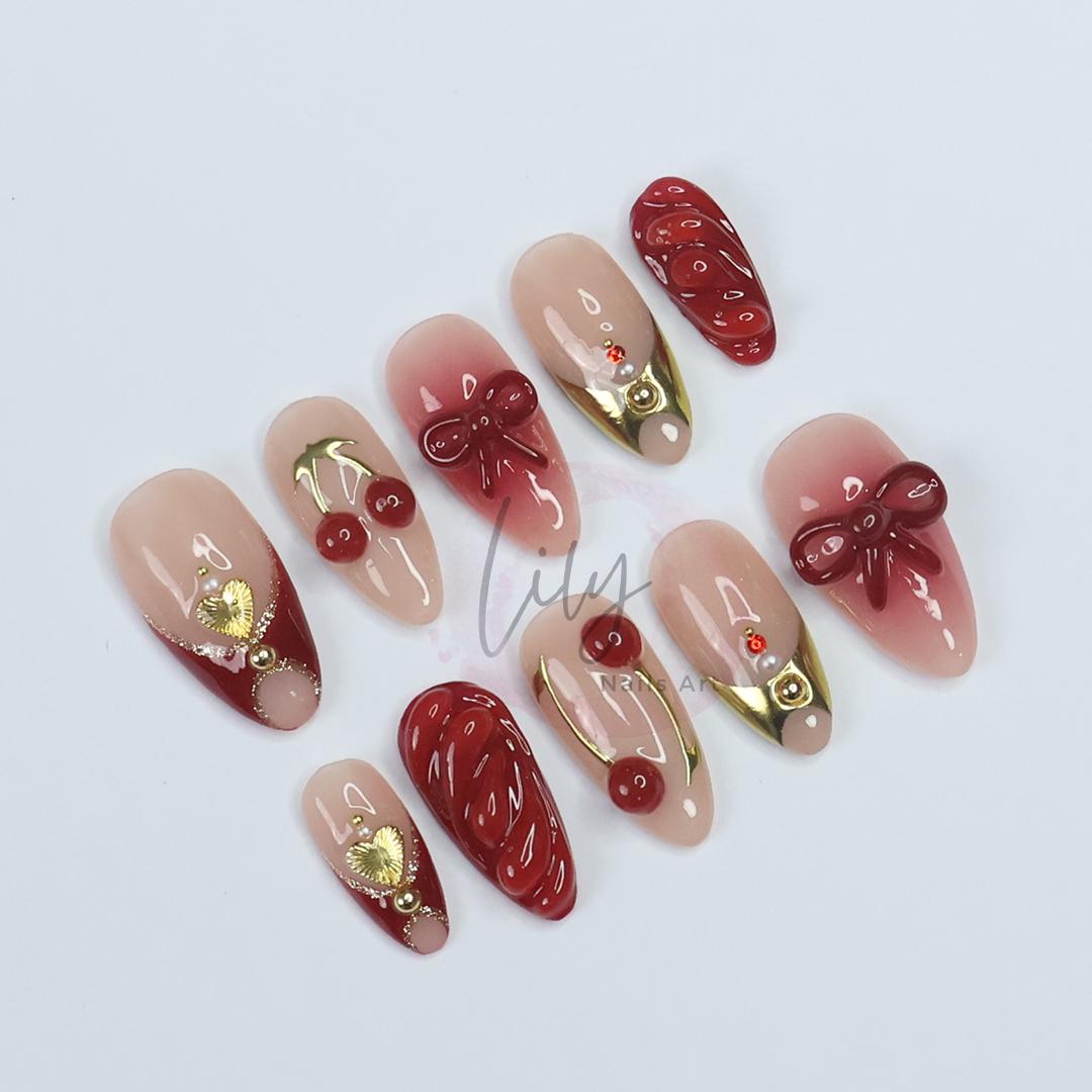 Elegant Cherry Press-On Nails - Red & Nude with 3D Bows, Gold Accents, Romantic Design - Medium Almond, Perfect Gift or Daily Nails