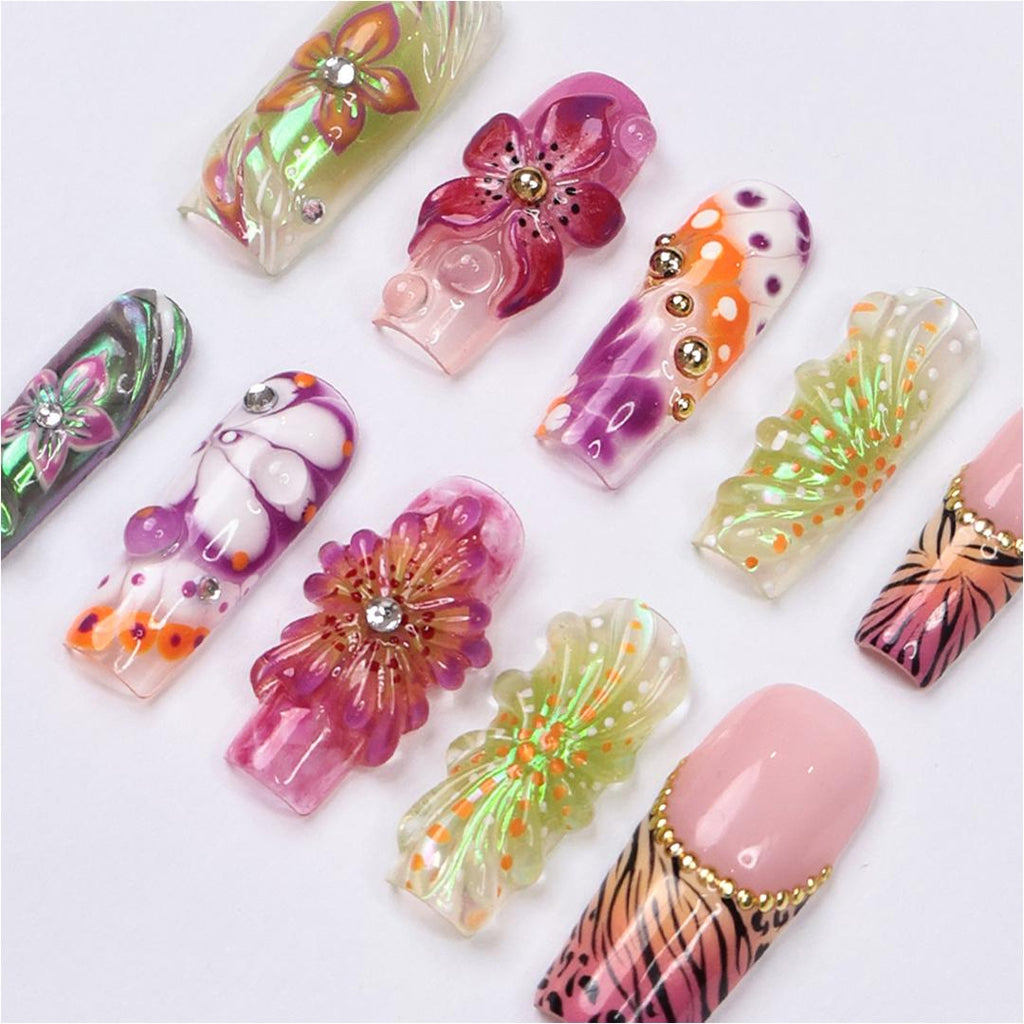 Vibrant spring press-on nails with 3D flowers, butterfly wings & animal print, perfect for birthdays, vacations or a unique gift for her
