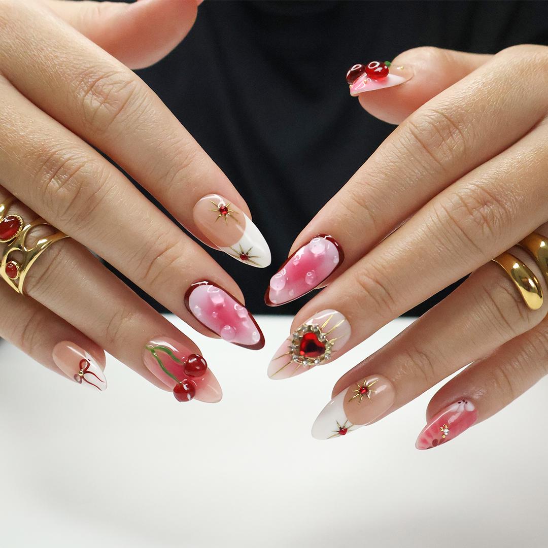 Press On Nails Golden Cupid with Cherry Charms | 3D Heart & Jewel Nails in Medium Almond | Handmade Romantic Nail Art for Holiday, Birthday