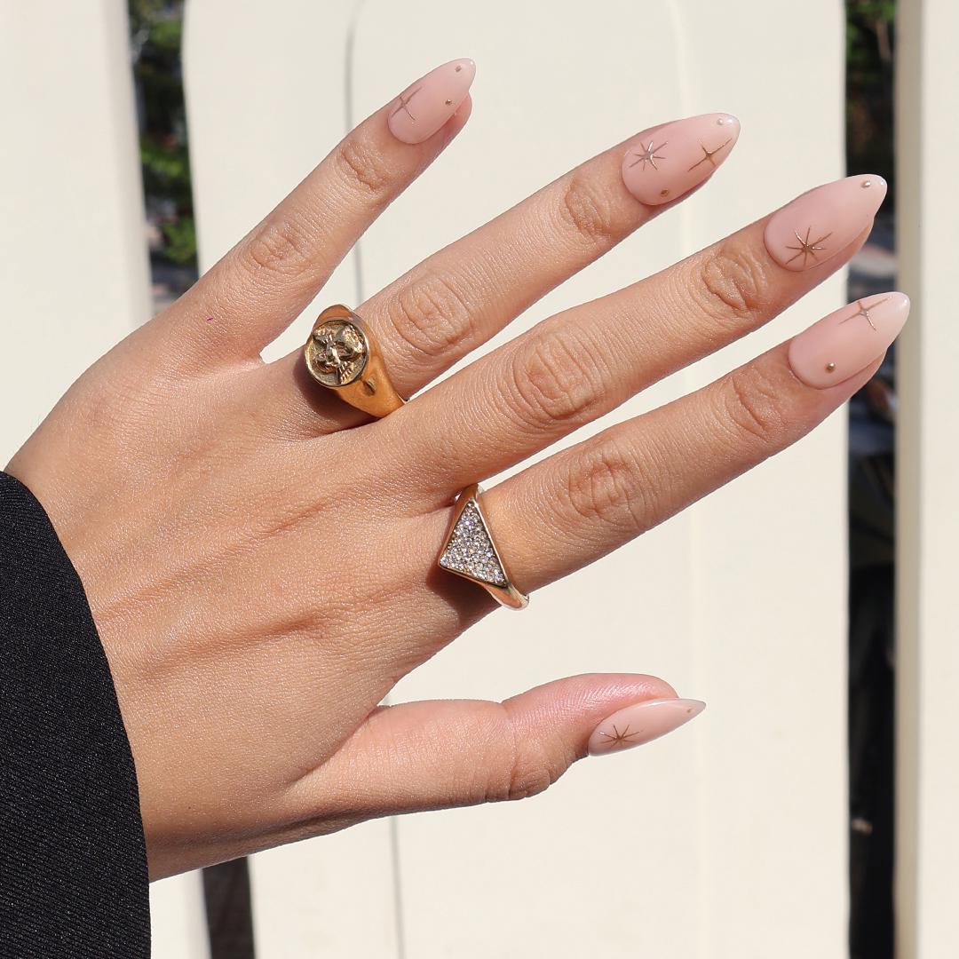 Minimal Press on Nail Gold Starburst with Nude Base | Everyday Fake Nail Art in Short Almond | Handmade Nail Art for Holiday, Birthday, Trip