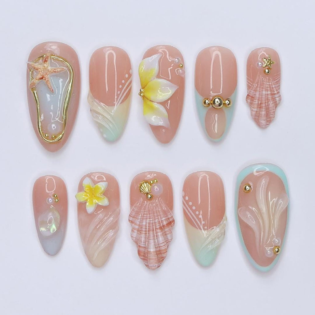 Summer Press On Nails Plumeria with Starfish | 3D Fake Nails in Medium Almond | Handmade Seashell Nail Art for Holiday, Vacation, Birthday
