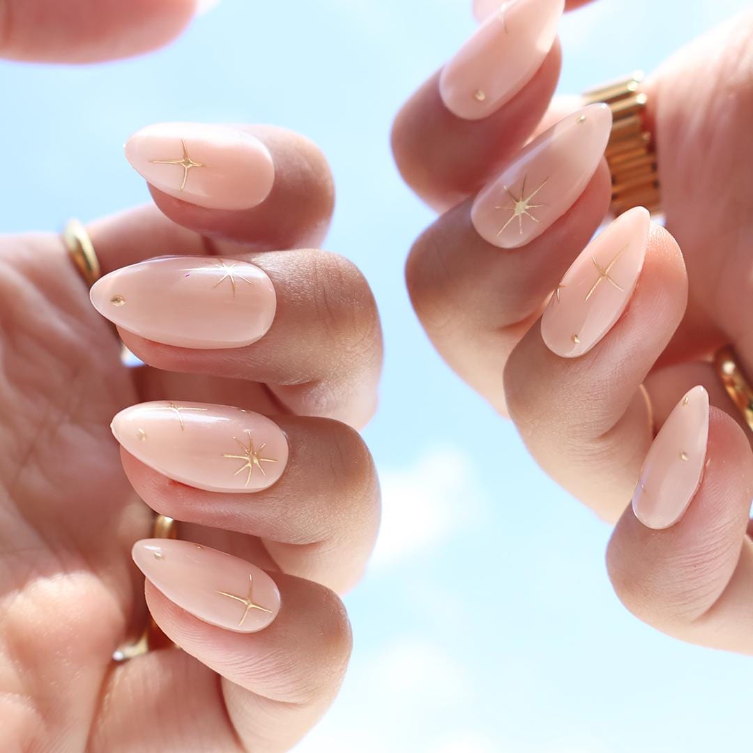 Minimal Press on Nail Gold Starburst with Nude Base | Everyday Fake Nail Art in Short Almond | Handmade Nail Art for Holiday, Birthday, Trip