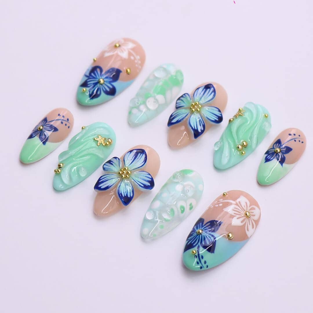 Press on Nails Mint Green with Blue Tropical Flowers | 3D Fake Nails in Medium Almond | Handmade Nail Art for Holiday, Vacation, Birthday