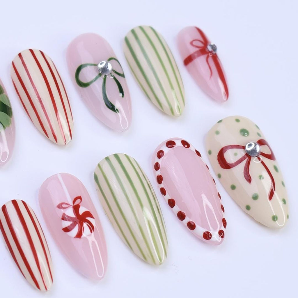 Christmas Press-On Nails with Wreath, Candy Stripes & Bow Designs | Medium Almond Fake Nails | Handmade Nail Art for Everyday Wear or Gift