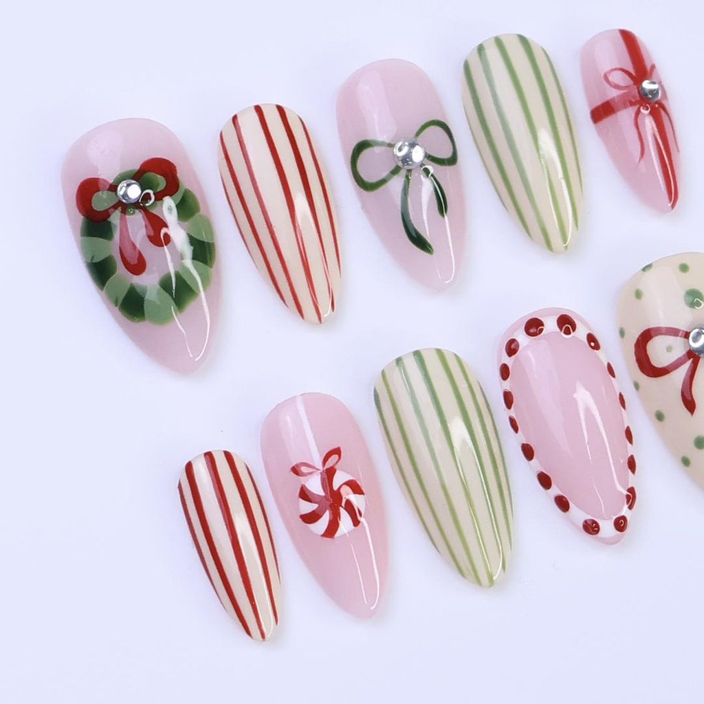 Christmas Press-On Nails with Wreath, Candy Stripes & Bow Designs | Medium Almond Fake Nails | Handmade Nail Art for Everyday Wear or Gift