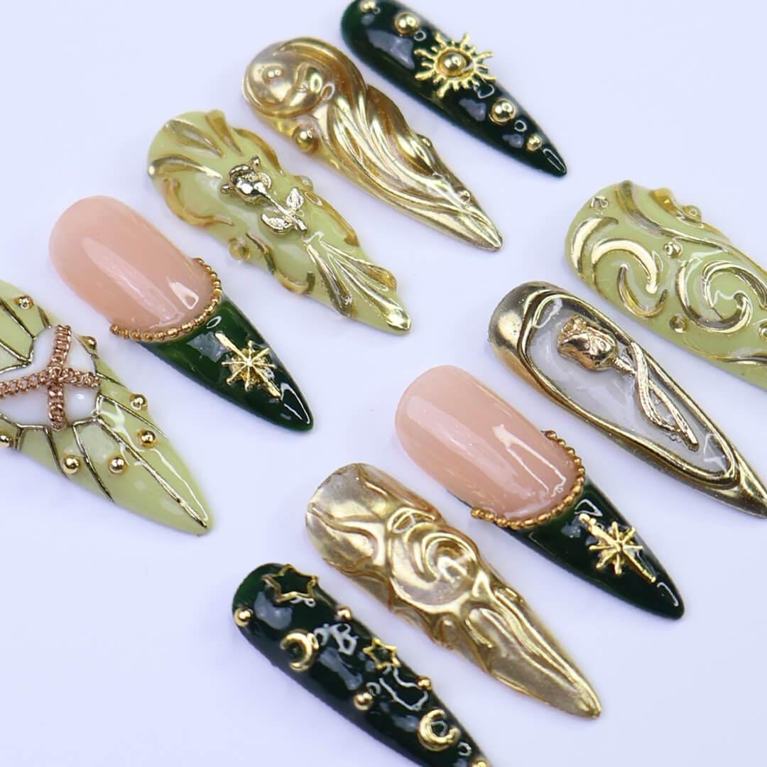 Luxury Green & Gold Press-On Nails with Baroque Swirl, Star, Moon Designs | Long Almond Fake Nails | Handmade Nail Art for Events or Gifts