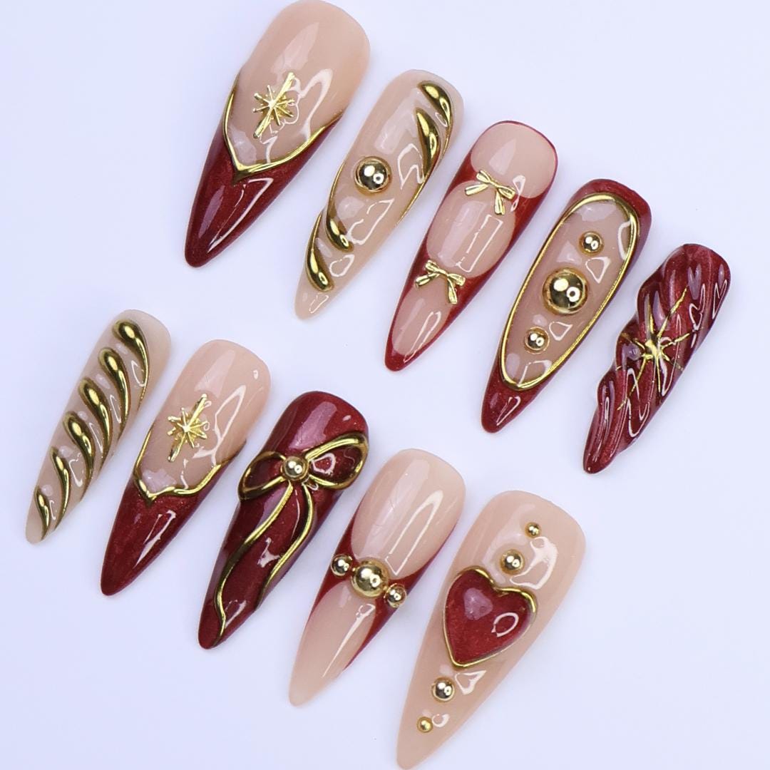 Christmas Red Press-On Nails with Gold Ribbon & Heart Designs | Long Stiletto Fake Nails | Handmade Holiday Luxury Nail Art