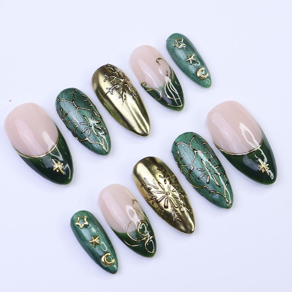 Christmas Press-On Nails in Green & Gold with Snowflake, Star and Moon Designs | Medium Almond Fake Nails | Handmade Holiday Nail Art
