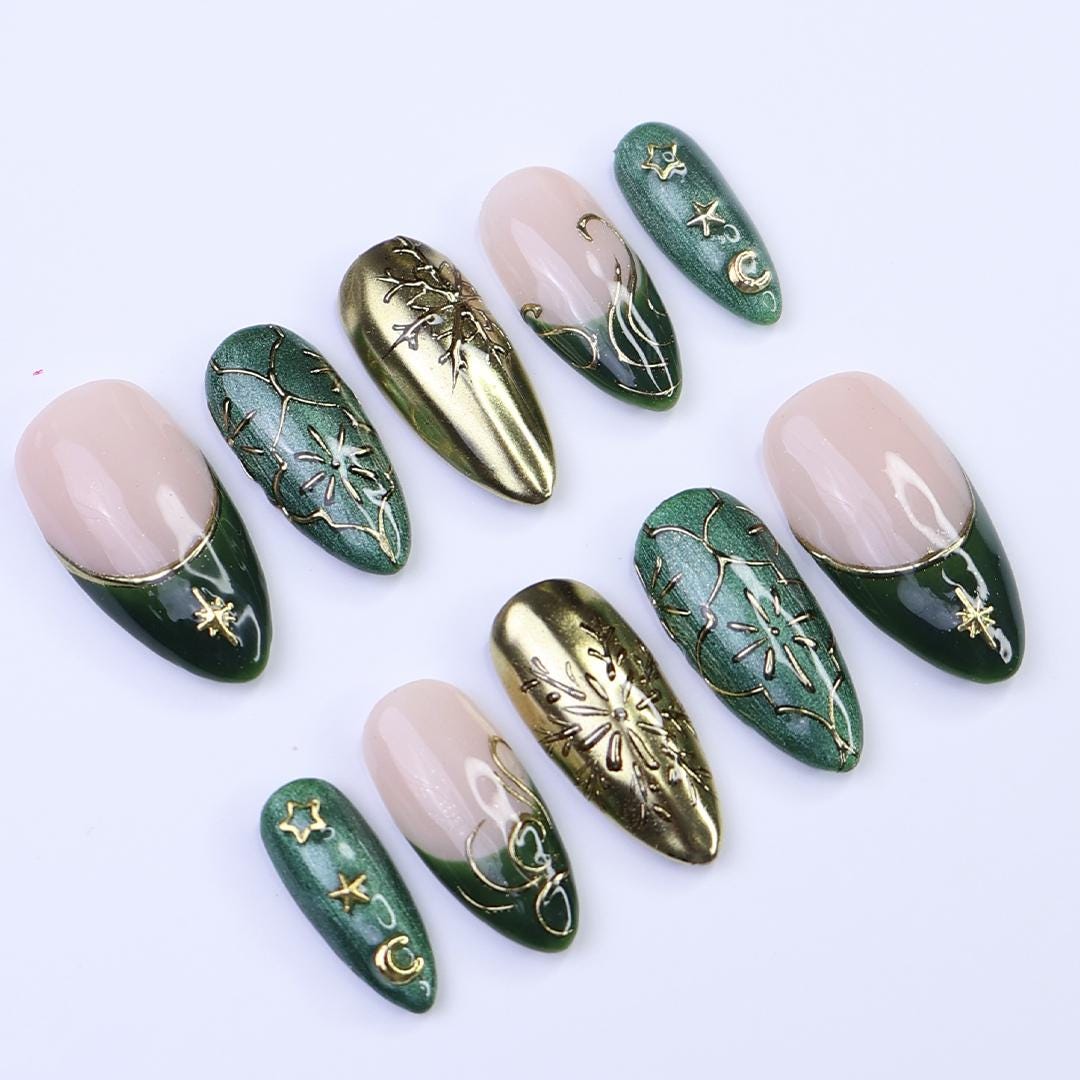 Christmas Press-On Nails in Green & Gold with Snowflake, Star and Moon Designs | Medium Almond Fake Nails | Handmade Holiday Nail Art