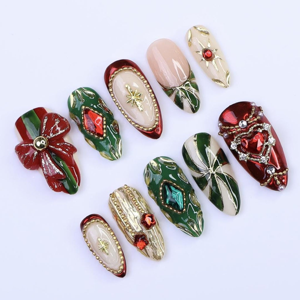 Christmas Press-On Nails with Red Bow, Emerald Gem & Gold Star Designs | Medium Almond Fake Nails | Handmade Luxury Holiday Nail Art