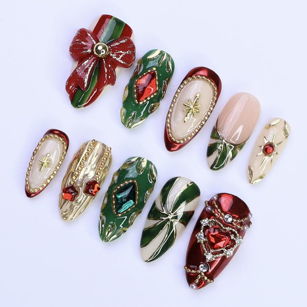 Christmas Press-On Nails with Red Bow, Emerald Gem & Gold Star Designs | Medium Almond Fake Nails | Handmade Luxury Holiday Nail Art