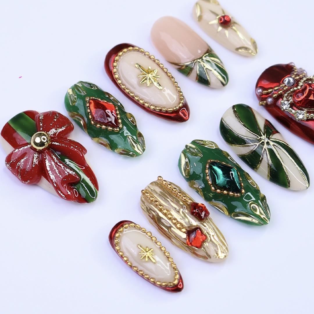 Christmas Press-On Nails with Red Bow, Emerald Gem & Gold Star Designs | Medium Almond Fake Nails | Handmade Luxury Holiday Nail Art