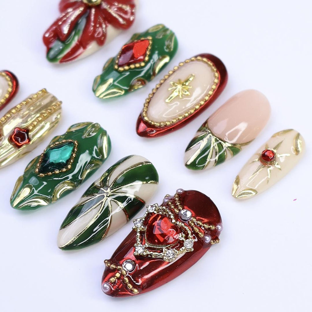 Christmas Press-On Nails with Red Bow, Emerald Gem & Gold Star Designs | Medium Almond Fake Nails | Handmade Luxury Holiday Nail Art