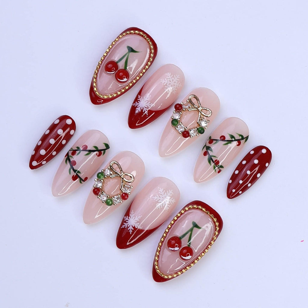 Christmas Press On Nails with Cherries, Snowflakes & Wreath Charms | Fake Nails in Medium Almond | Handmade Holiday Nail Art Gift Set