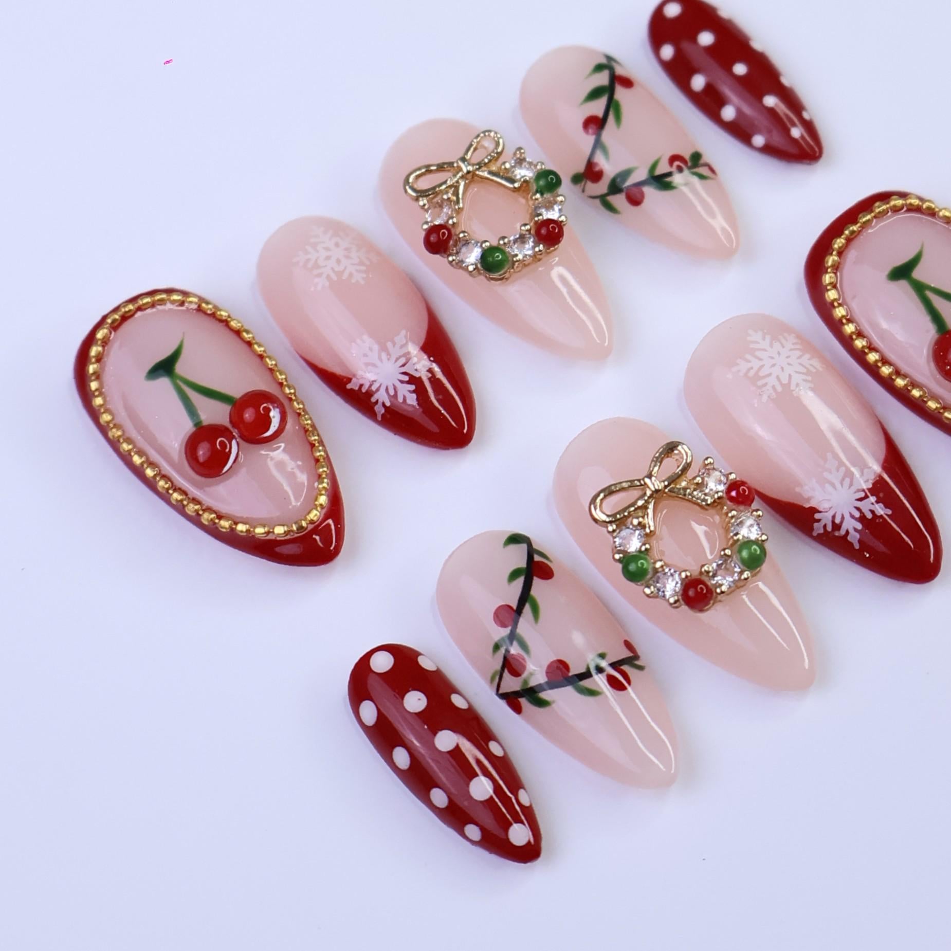 Christmas Press On Nails with Cherries, Snowflakes & Wreath Charms | Fake Nails in Medium Almond | Handmade Holiday Nail Art Gift Set