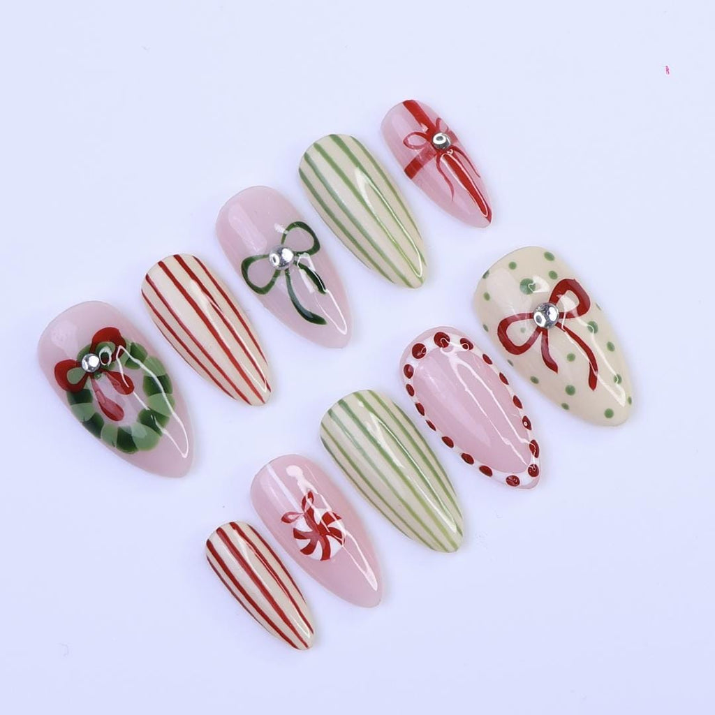 Christmas Press-On Nails with Wreath, Candy Stripes & Bow Designs | Medium Almond Fake Nails | Handmade Nail Art for Everyday Wear or Gift
