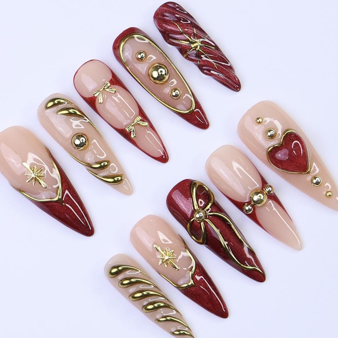 Christmas Red Press-On Nails with Gold Ribbon & Heart Designs | Long Stiletto Fake Nails | Handmade Holiday Luxury Nail Art
