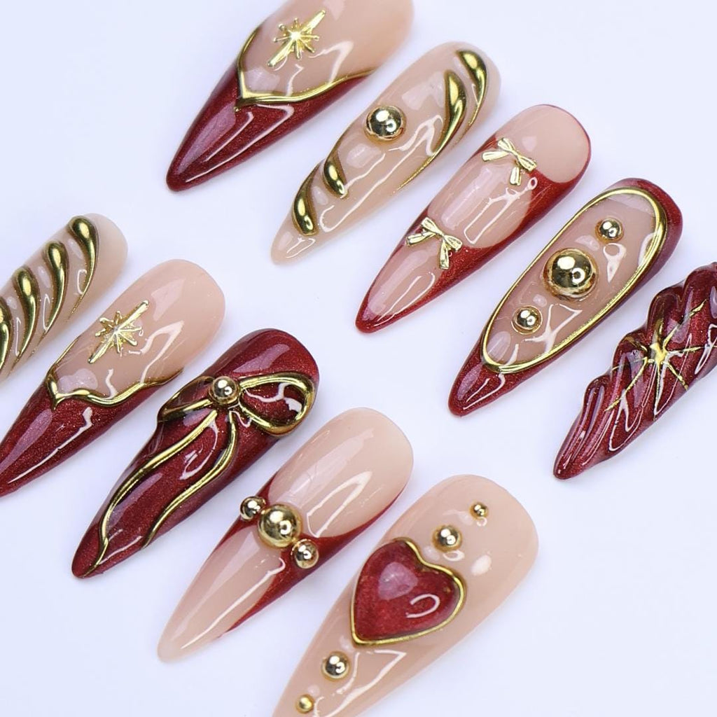 Christmas Red Press-On Nails with Gold Ribbon & Heart Designs | Long Stiletto Fake Nails | Handmade Holiday Luxury Nail Art