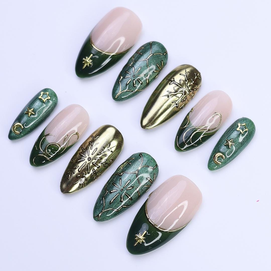 Christmas Press-On Nails in Green & Gold with Snowflake, Star and Moon Designs | Medium Almond Fake Nails | Handmade Holiday Nail Art
