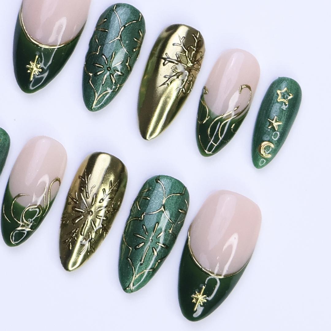 Christmas Press-On Nails in Green & Gold with Snowflake, Star and Moon Designs | Medium Almond Fake Nails | Handmade Holiday Nail Art