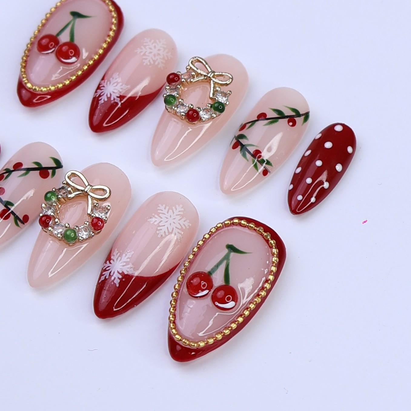 Christmas Press On Nails with Cherries, Snowflakes & Wreath Charms | Fake Nails in Medium Almond | Handmade Holiday Nail Art Gift Set