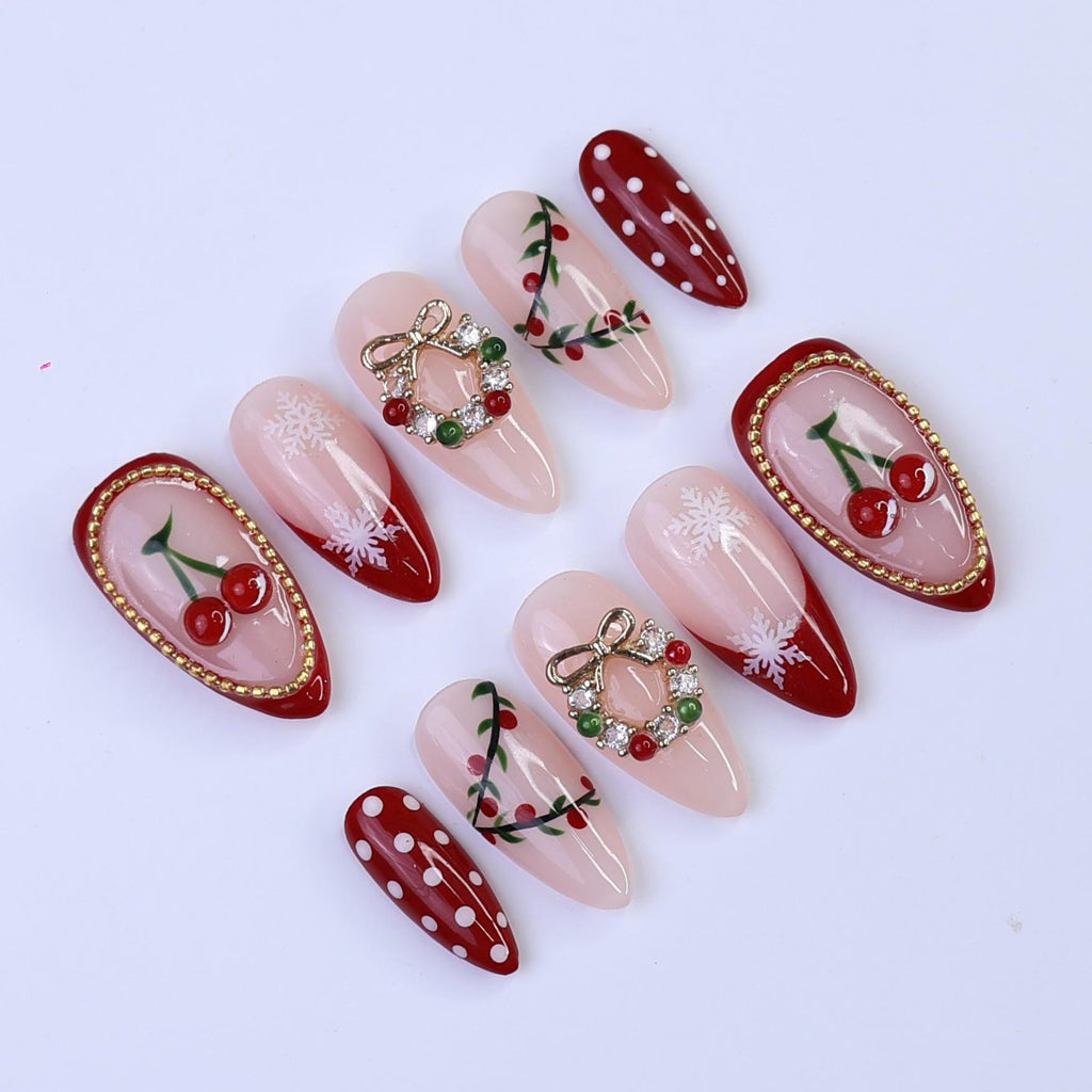 Christmas Press On Nails with Cherries, Snowflakes & Wreath Charms | Fake Nails in Medium Almond | Handmade Holiday Nail Art Gift Set
