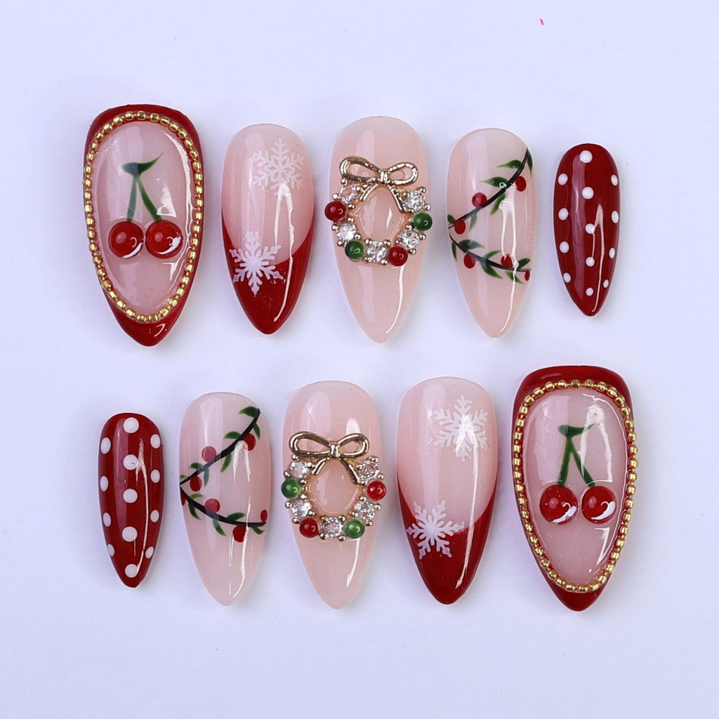 Christmas Press On Nails with Cherries, Snowflakes & Wreath Charms | Fake Nails in Medium Almond | Handmade Holiday Nail Art Gift Set